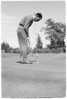 Golfer Fay Coleman demonstrates a series of "right" and "wrong" golf swings