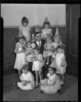 Sheriff Gene Biscailuz and young orphan girls, Los Angeles, 1936