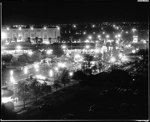 Birdseye view of the "Fun Zone" of the Los Angeles County Fair at night, ca.1953-1958