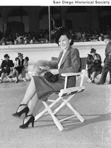 Patricia Taylor seated in a folding chair at the Agua Caliente Racetrack