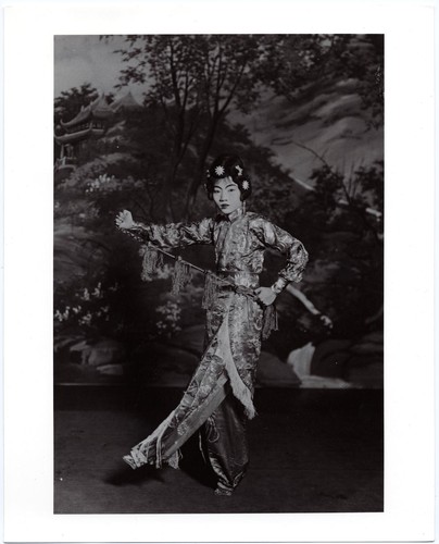 Actress in the role of a wu dan on imaginary horseback /