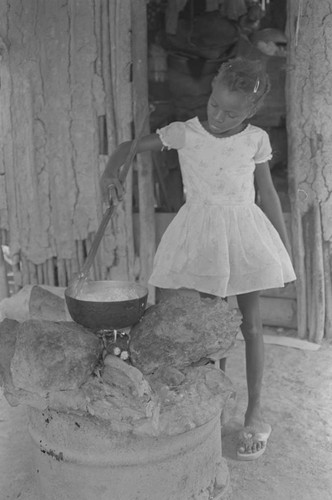 Girl stirring a pot, San Basilio de Palenque, ca. 1978