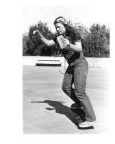 Gretchen Gibson skateboarding with Sony Walkman