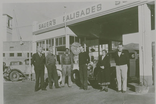 Group portrait in front of Jack Sauer's Service Station in Pacific Palisades