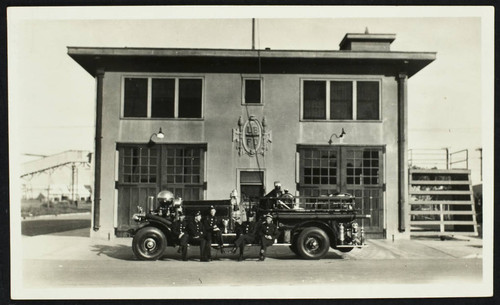 Unidentified personnel with fire engine in front of old Station No. 6, 1355 W. 1st St