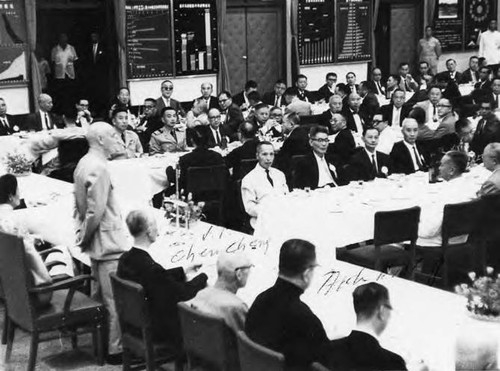 Chiang Kai-Shek, president of the Republic of China, standing at a table, addressing participants of Chinese Culture conference