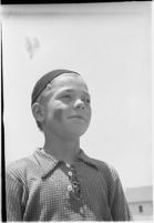 Boy takes part in a free summer camp organized by Los Angeles Sheriff Eugene Biscailuz. Circa July 1937