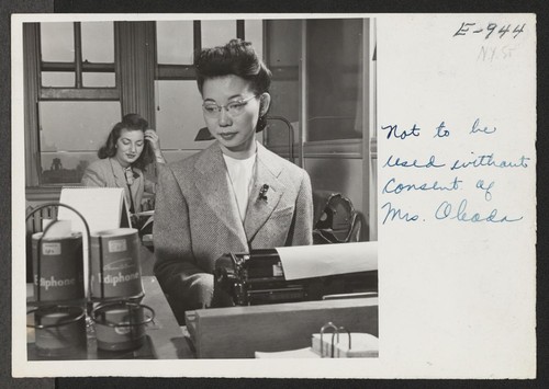 Mrs. Mary Okada is a private secretary in a New York City office. Before relocation, she worked in a Seattle import and export company. Photographer: Parker, Tom New York, New York