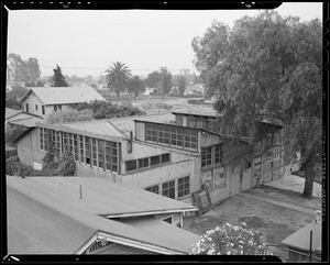Exteriors of former factory and present factory, Southern California, 1940