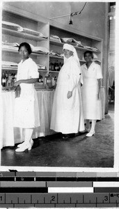Sr. Mercedes, MM, and two nurses in St. Paul's Hospital second floor dressing room, Manila, Philippines, December 1929