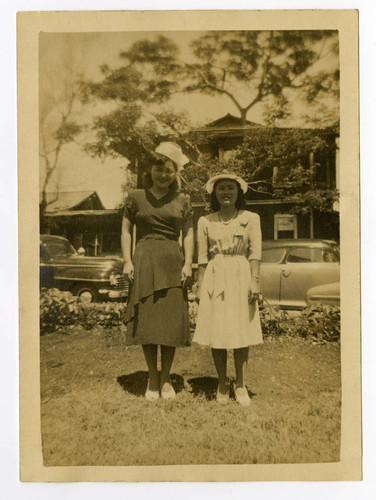 Betty Takamori standing next to woman