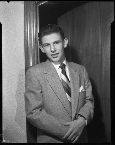 Loydell Emerson in doorway, Los Angeles, 1953