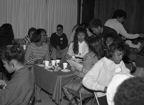 Alpha Kappa Alpha chapter members hosting a holiday party, Los Angeles, 1989