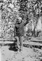 Karl Asman standing in a hops field