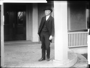 Luther Burbank standing on the porch of his home, Santa Rosa, California, ca.1910