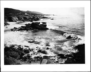 Waves crashing violently on the Arch Rocks at Laguna Beach, ca.1885