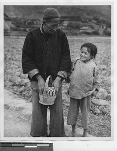 A man and his Granddaughter at Luyun