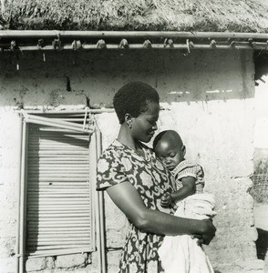 Wife of a Bamileke evangelist, with her child, in Cameroon