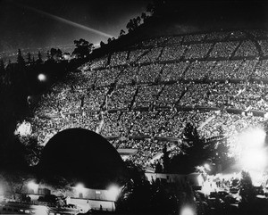 Panoramic view of the Hollywood Bowl at night, showing spectators, 1940