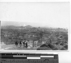 A view of a village and distant mountains in North China, China, 1930