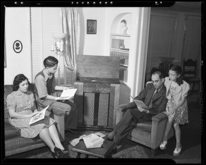 Family group listening to recording, Southern California, 1940