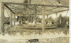 1915 Gravenstein Apple Show display a of Merry-Go-Round made of whole and dried apples