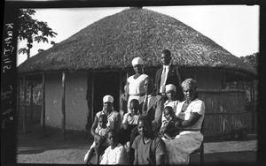 African people in front of a hut, Mozambique, ca. 1933-1939