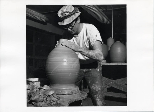 Jon Stokesbury with pottery wheel, Scripps College