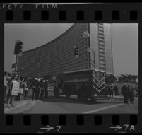 Patrol wagon parked in front of Century Plaza Hotel in anticipation of anti-War demonstration accompanying President Johnson's visit, 1967