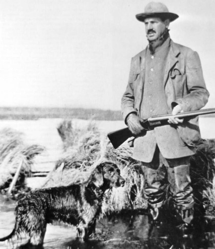 James Harvey Irvine, Sr. with dogs