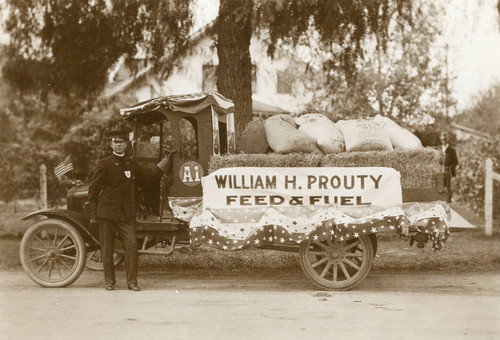 William H. Prouty float in parade in downtown Banning, California in 1917-1919