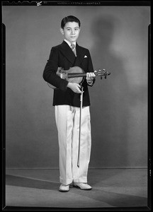 Boy with violin, Southern California, 1940