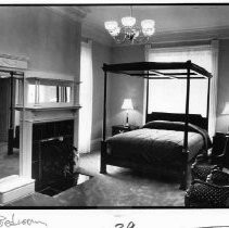Bedroom with fireplace in Sterling Hotel