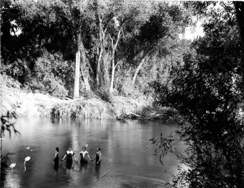 Two Men and Two Women in Feather River