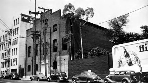 Plaza Substation, Los Angeles Street side view with cars parked in front