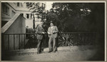 [Alfred Fuhrman standing at railing with man]