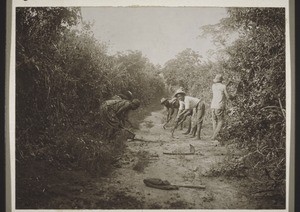 Cleaning the road near Abokobi