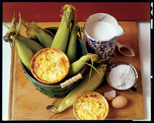 Corn pudding with cobs of corn
