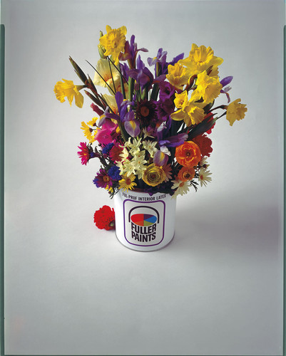 A bouquet of Spring flowers in a Fuller Paints can