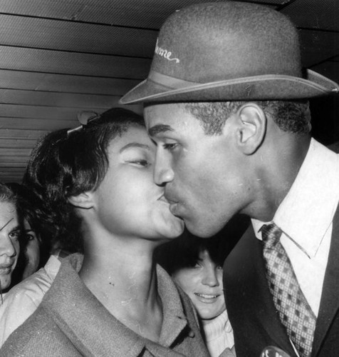 Mr. and Mrs. O. J. Simpson kissing