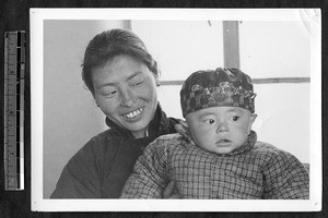 Muslim mother and child, Jinan, Shandong, China, 1941