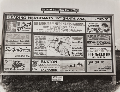 Lou P. Hickox photograph of advertising billboards pertaining to merchants in Santa Ana