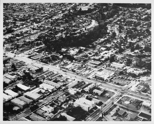 Aerial view facing northwest over the boundary between Los Angeles and Santa Monica at Wilshire Boulevard and Bundy Drive