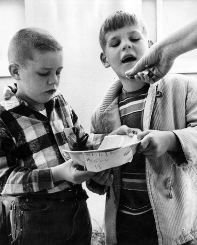 Bobby, left, and Tony collect 61 cents