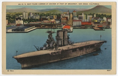 U.S. Navy plane carrier at anchor at foot of Broadway, San Diego, California