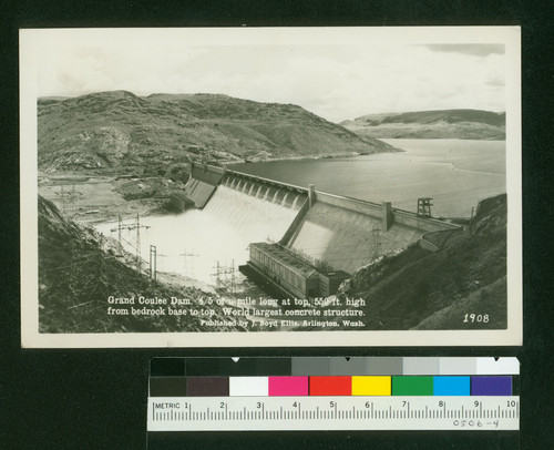 Grand Coulee Dam. 4/5 of a mile long at top, 550 ft. high from bedrock base to top. World largest concrete structure