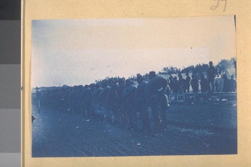 1st Colorado Volunteers in heavy marching order ready to march to the ferry to embark for the Phillipines