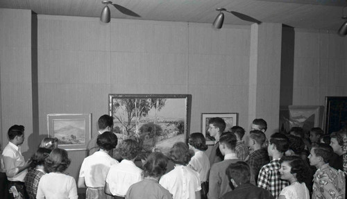 Art class viewing a painting at Mountain View Cemetery