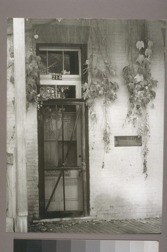 Doorway with vines. Nevada City. 1934