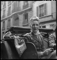 [Marie Madeleine in car, leaving for Germany]
